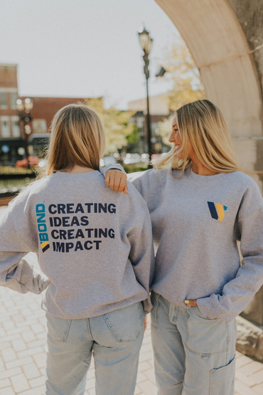 Customer wearing a 18000 Gildan Crewneck Sweatshirt