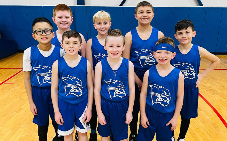 Group shot depicitng serval people wearing custom apparel