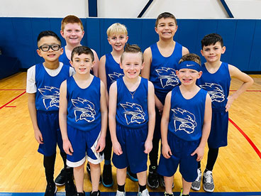 Group shot depicitng serval people wearing custom apparel