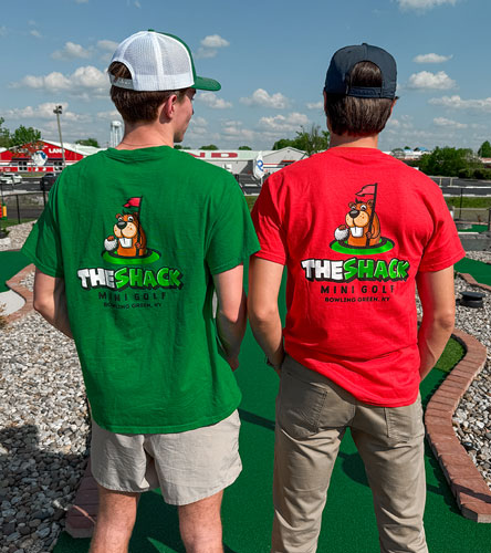 Group shot depicitng serval people wearing custom apparel