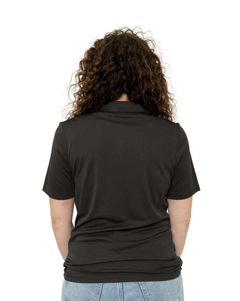 Image of a model wearing a LST520 Sport-Tek Ladies Posi-UV Pro Polo