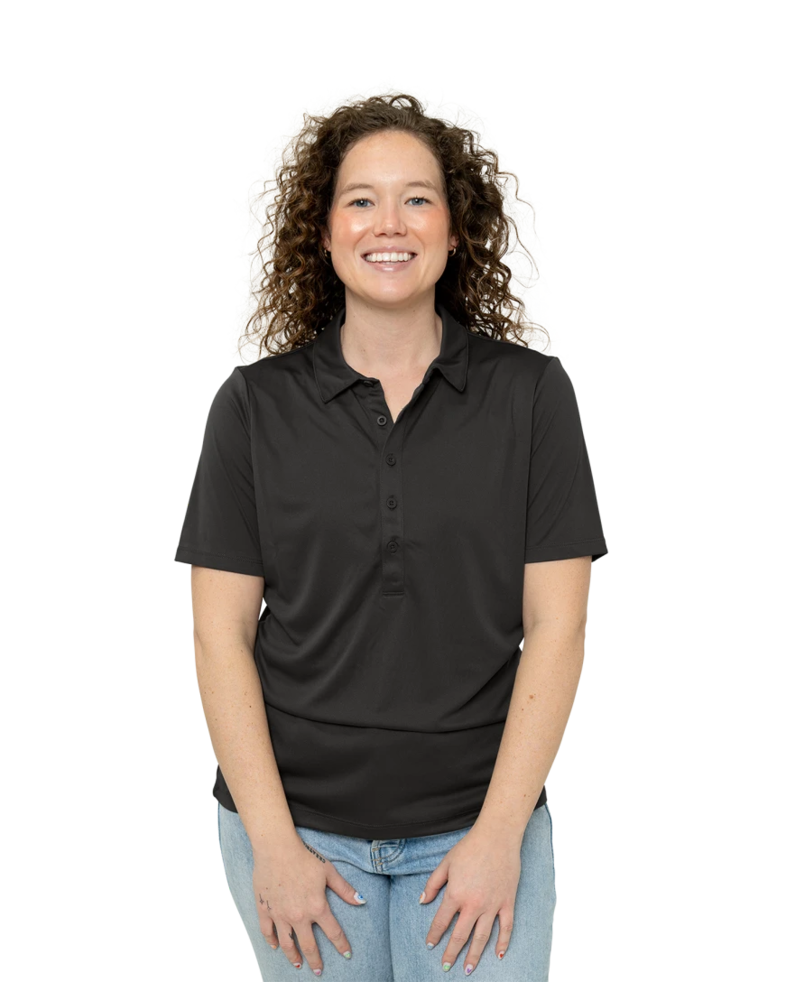 Image of a model wearing a LST520 Sport-Tek Ladies Posi-UV Pro Polo